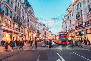 The Regent Street, high class shopping street, decorated with Christmas lights and blurred traffic (Getty Images)