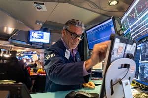 Traders work on the floor of the New York Stock Exchange on Oct. 20 in New York City. (Getty Images)