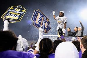 Players from the James Madison Dukes celebrate after winning the Sun Belt Conference championship against the Troy Trojans on Dec. 5 in Harrisonburg, Virginia. James Madison advances to play the Oregon Ducks on Saturday, Dec. 20, in the first round of the 2025-26 College Football Playoff.  (Getty Images)