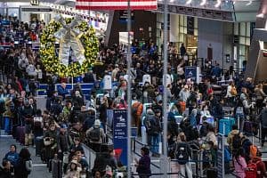 People move through a packed departures level at Terminal A at Boston's Logan Airport on December 23, 2024, ahead of the upcoming Christmas holiday. AAA reports that an estimated 7.85 million passengers will be flying this holiday season. (Getty Images)