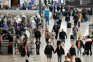 Passengers check in at San Francisco International Airport. (Getty Images)