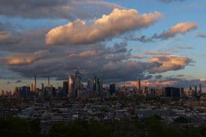 Clouds pass over the skyline of midtown Manhattan and the Empire State Building as the sun sets in New York City on May 2, 2023, as seen from Jersey City, New Jersey. (Getty Images)