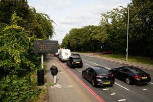 A digital display board warns drivers of the introduction of the new boundary for the LEZ and ULEZ expansion on Aug. 29 in London, England. (Getty Images)