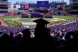 Graduates listen as Finnish Prime Minister Sanna Marin speaks after she received a Doctor of Humane Letters honorary degree during New York University's celebration of the Class of 2023 All-University Commencement at Yankee Stadium in the Bronx on May 17. (Getty Images)