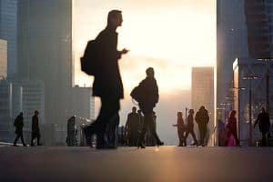 Silhouettes on the forecourt of La Défense in Paris. (Getty Images)
