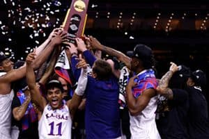 The Kansas Jayhawks celebrate their victory against the North Carolina Tar Heels during the 2022 NCAA Men's Basketball Tournament Final Four Championship at Caesars Superdome in New Orleans. (Getty Images)