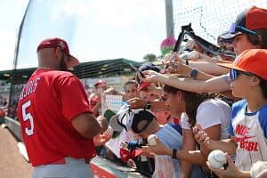 St. Louis Cardinals first baseman Albert Pujols signs autographs for fans before a Spring Training game against the Miami Marlins on April 6 at Roger Dean Stadium in Jupiter, Florida. (Icon Sportswire/Getty Images)
