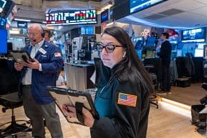 Traders work on the floor of the New York Stock Exchange on Dec. 2 in New York City. (Photo by Spencer Platt/Getty Images) (Getty Images)