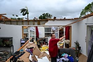 Robert Haight looks around his destroyed house on Oct. 9, 2024, after it was hit by a reported tornado in Fort Myers, Florida, caused by Hurricane Milton. (AFP via Getty Images)