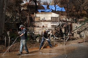 Natural disasters such as recent mudslides in California, wildfires in Los Angeles and Maui and flood and wind damage from hurricanes in the Southeast U.S. have led to rising insurance costs for hoteliers. (Getty Images)