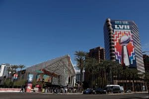 Fans walk around downtown Phoenix, outside of the fan experience, ahead of Super Bowl LVII on Feb. 11. (Getty Images)