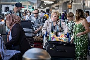 A large number of travelers make their way through Tom Bradley International Terminal at LAX, as a record amount of passengers pass through the airport today wrapping up a busy July Fourth holiday on Sunday, July 7, in Los Angeles, California. (Los Angeles Times/Getty Images) 