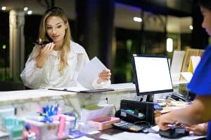 Among its many other uses, artificial intelligence is powering real-time translation — something experts say can benefit travelers booking over the phone or checking in on site. (Getty Images)