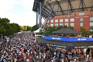 Spectators walk outside Arthur Ashe Stadium on day two of the U.S. Open at the USTA Billie Jean King National Tennis Center in New York City, on Aug. 25. (Getty Images)